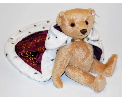 A Steiff Queen Elizabeth II Coronation blond mohair teddy-bear, No.570, having button to ear and growler, with robes, boxed a