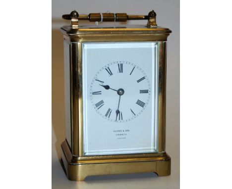 An early 20th century lacquered brass cased carriage clock having enamel dial with Roman numerals signed Aldred & Son, Yarmou