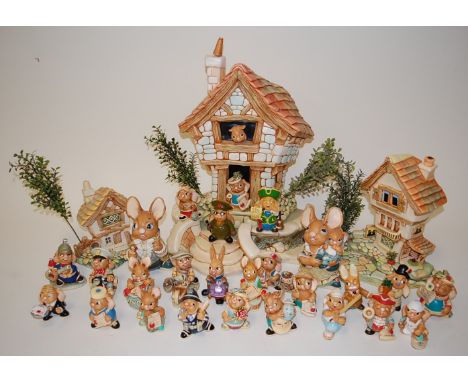 A collection of Pendelfin rabbit figures and ornaments to include Tidy Patch, Fireman, Postie, Peggy, Tom, and Sweep, etc