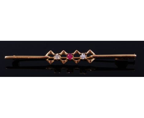 An 18ct gold, ruby and diamond bar brooch, 3.4g, 5.8cm