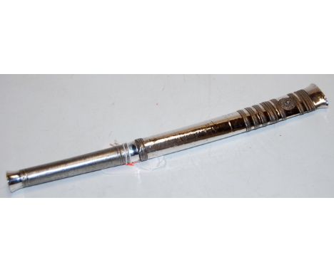 An early 20th century eastern dagger having a 13.5 single edged slightly curved blade with white metal handle and embossed wh
