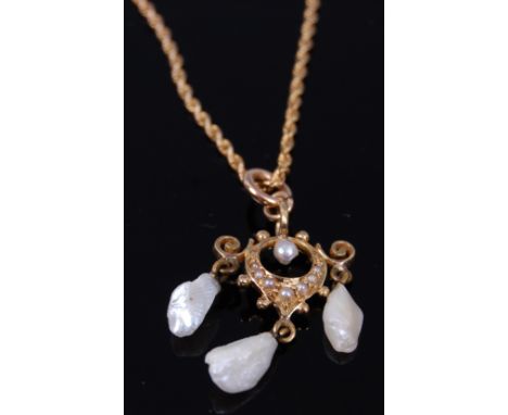 A 9ct gold, seed pearl and mother of pearl set pendant, on ropetwist neck chain, gross weight 4.4g 