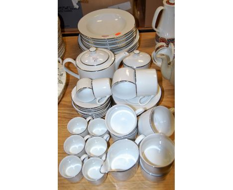 A Royal Worcester six place setting tea and dinner service in the Classic Platinum pattern