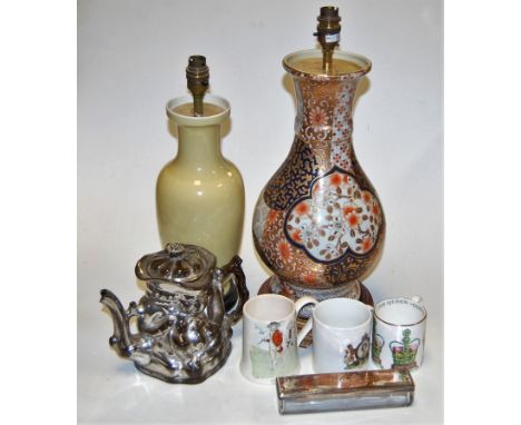 A box of miscellaneous items, to include; large Imari pattern table lamp; one other table lamp; and a silver lustre teapot et