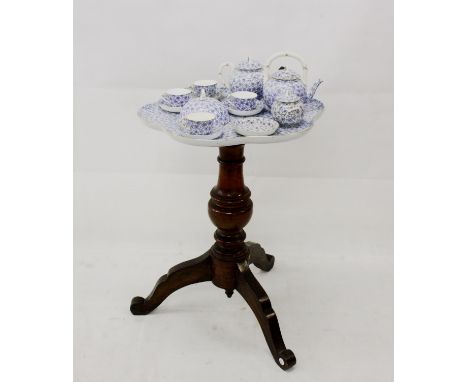 A Royal Worcester part tea set, on porcelain lobed tray table mounted on later tripod base c.1880, comprising four cups, five