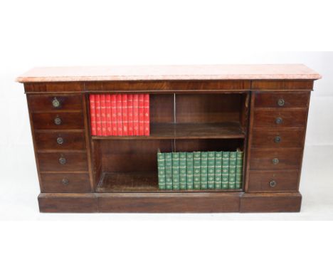 A pair of 19th Century three quarter height pink marble topped open bookcases, with central adjustable single shelf flanked b