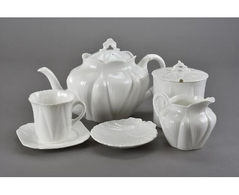 A Shelley Dainty pattern tea service, comprising teapot and stand, cylindrical sugar bowl and cover, milk jug, two bowls, thr