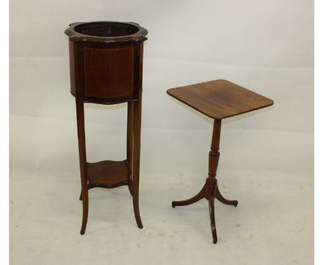 An Edwardian mahogany and chequered strung serpentine plant stand, supported on tapered swept legs united by pot shelf, 37 cm