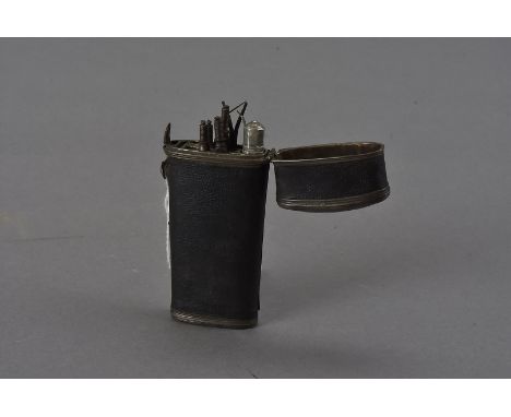 An 18th Century silver plated and leather etui, the interior with five tools and one octagonal handle, 9 cm 