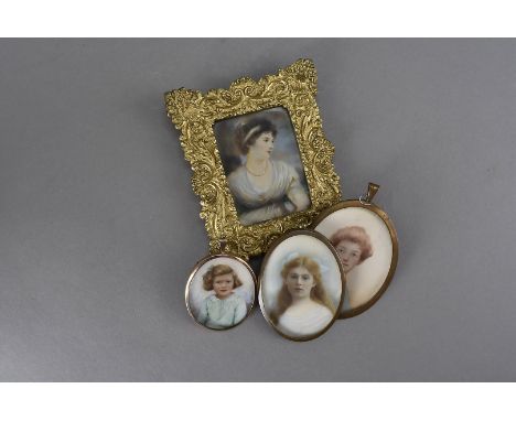 English early 20th century miniature on ivory, of a three quarter length portrait of a young girl in a 9ct gold mount London 