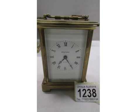 A Bayard brass carriage clock in working order.