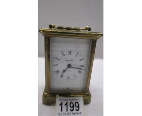 A Bayard brass carriage clock in working order, 11.5 cm tall.