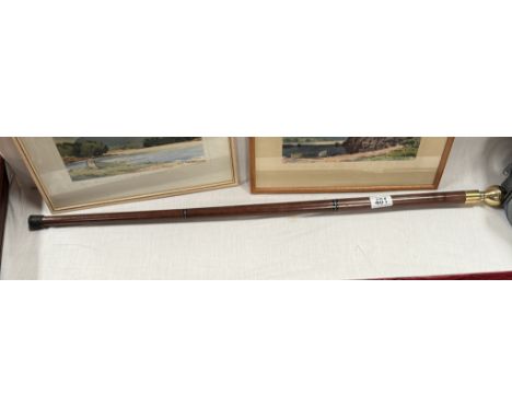 A brass top walking stick. Separated into 3 pieces