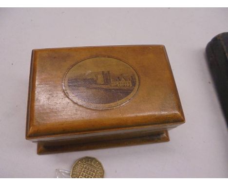 A Mauchlin ware box of Inverness Cathedral, a quantity of coins including silver and a cut throat razor in case.