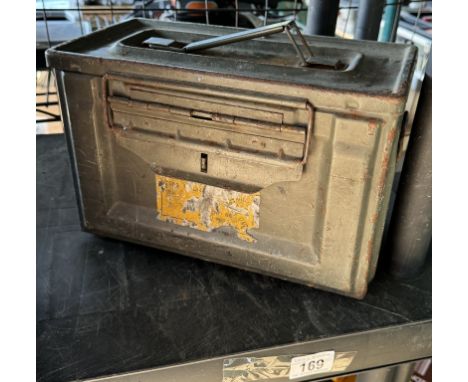 A metal carry case with assorted tools