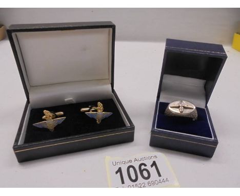 A silver Parachute Regiment ring size S and a pair of Parachute Regiment cuff links.
