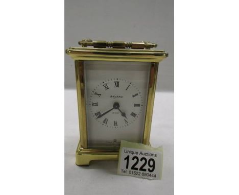 A Bayard brass carriage clock in working order.