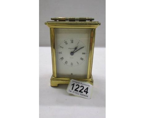 A Bayard brass carriage clock in working order.