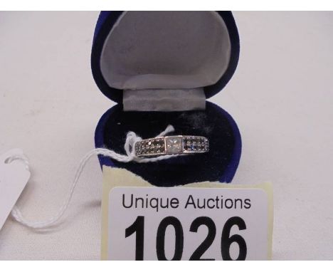 An 18ct white gold ring (750) set Black diamonds, size K, 3.7 grams.
