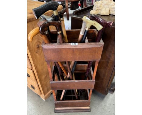 A stick stand and quantity of sticks