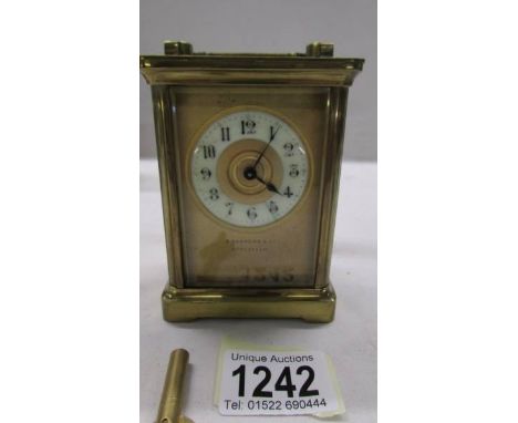 A good quality brass carriage clock with key and in working order, marked S Sanders &amp; Co., Streatham.