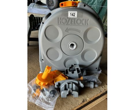 A Hoselock hose pipe on reel with attachments