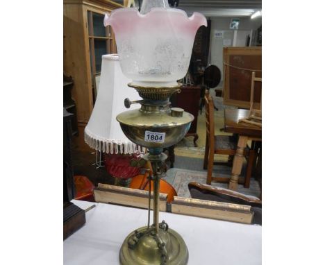 An art nouveau brass oil lamp, COLLECT ONLY.