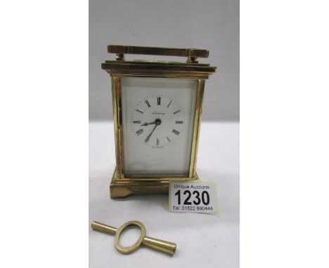 A Salisbury brass carriage clock with key and in working order.Does not chime. Roughly 1970's 