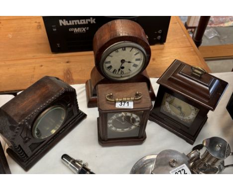 3 mantle clocks and an empty caseSmall wooden carriage clock Winds and runs. Case would benefit from a clean.Height including