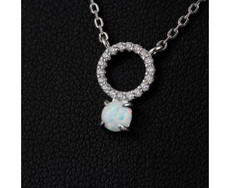 A 925 silver necklace with an opal and white stone set pendant, L. 44cm.