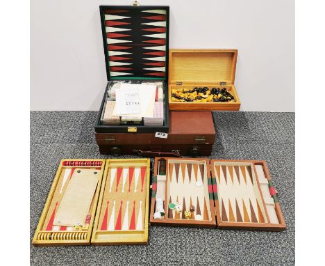 A group of boxed vintage games.