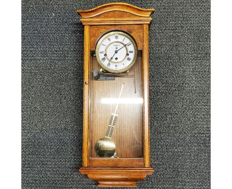 A Smallcombe chiming oak wall clock, H. 65cm.