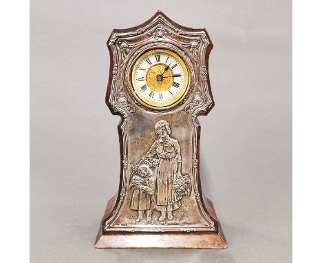 An Art Nouveau hallmarked silver fronted mantle clock, understood to be in working order, H. 22.5cm.