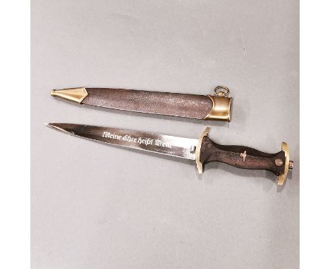 A reproduction German military dagger, L. 39cm.