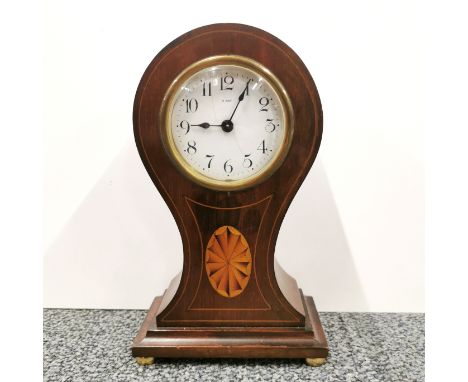 An Edwardian inlaid mahogany mantle clock, H. 23cm. Understood to be in working order.