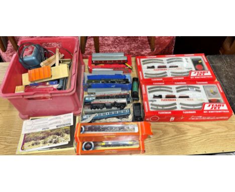 Two Fleischmann miniature railway starting sets together with a quantity of Hornby 00 gauge and other railway items.