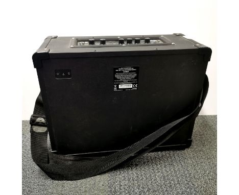 A Blackstar ID CORE stereo 40 speaker with carrying strap, 43 x 34 x 18cm.