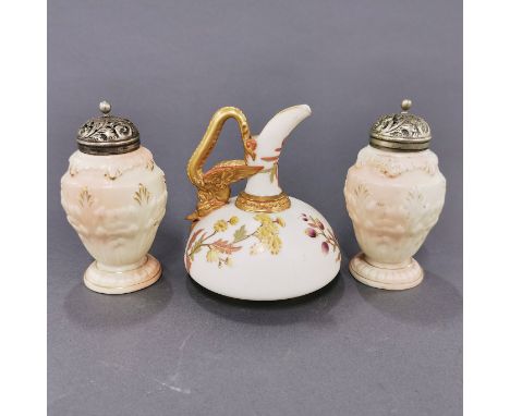A Royal Worcester blush jug with a pair of Worcester sugar shakers, H. 11cm.