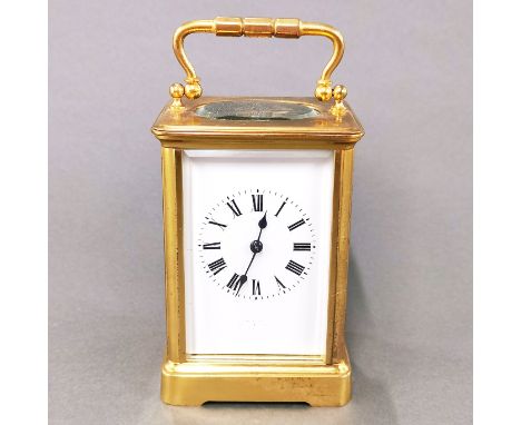 A gilt brass chiming carriage clock, understood to be in working order, H. 16cm.