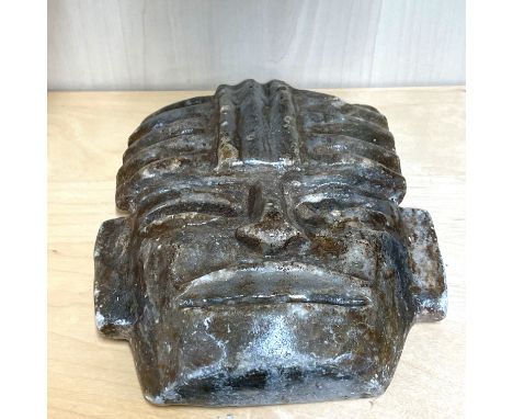 A carved hardstone Aztec tribal mask, H. 25cm.