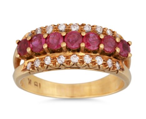 A VINTAGE DIAMOND AND RUBY DRESS RING, three rowed, ca 1960, mounted in 18ct gold. Size: N