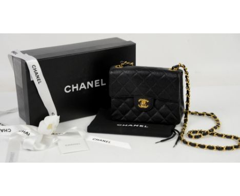 Vintage Chanel caviar classic mini flap bag with gold hardware, box, authenticity card number 6924822 to match sticker in bag