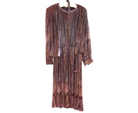 Diana Freis ensemble comprising blouson style long sleeved top, puff sleeved jacket, and long skirt with concertina pleated p