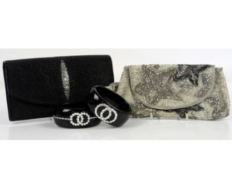 Stingray leather evening bag, together with a pale grey satin beaded bag and two designer style black “cuff” bangles with fau