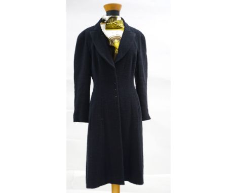Chanel black and navy boucle tweed long coat 2002 Autumn Collection with silk lining with Chanel and floral motif size 42Scar