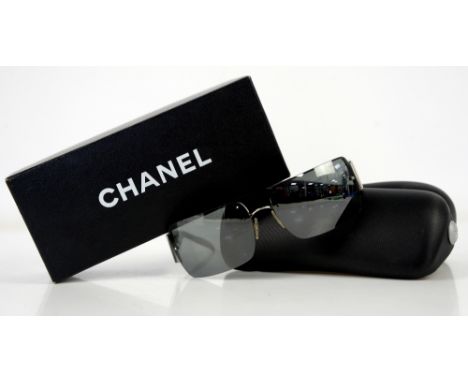 Chanel black sunglasses with diamanté panels to arms featuring crossed  C’s logo and frameless mirror effect lenses, together