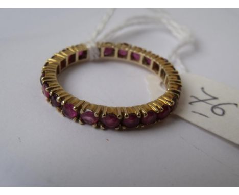 Gold and ruby full eternity ring approx size S    