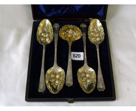 An attractive set of four berry spoons and a sifter ladle  with bottom marks in fitted case      