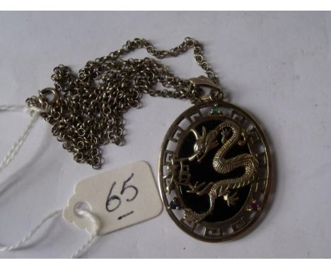 A Large 4cm long Onyx mounted Dragon pendant  necklace set with diamond, emerald, ruby & sapphire   