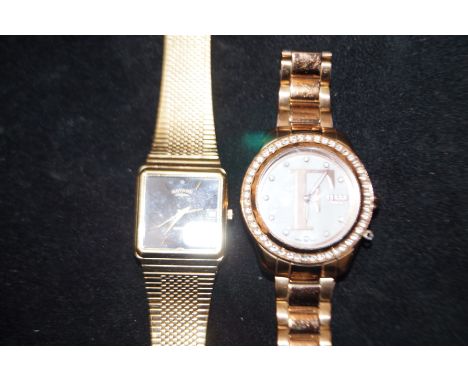 Ferre Millan fashion watch together with a rotary wristwatch